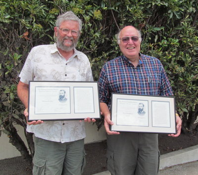 Mike Prather and Pete Pumphrey receiving the Dutcher Award